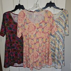 Floral Patterned LULAROE- Set of Three SHIRTS SIZE SMALL